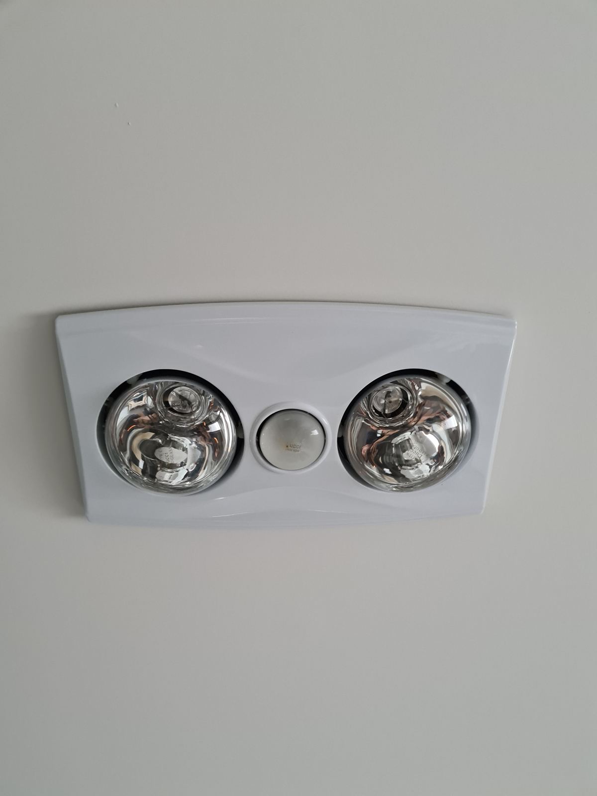 Bathroom heat lamp and exhaust fan
