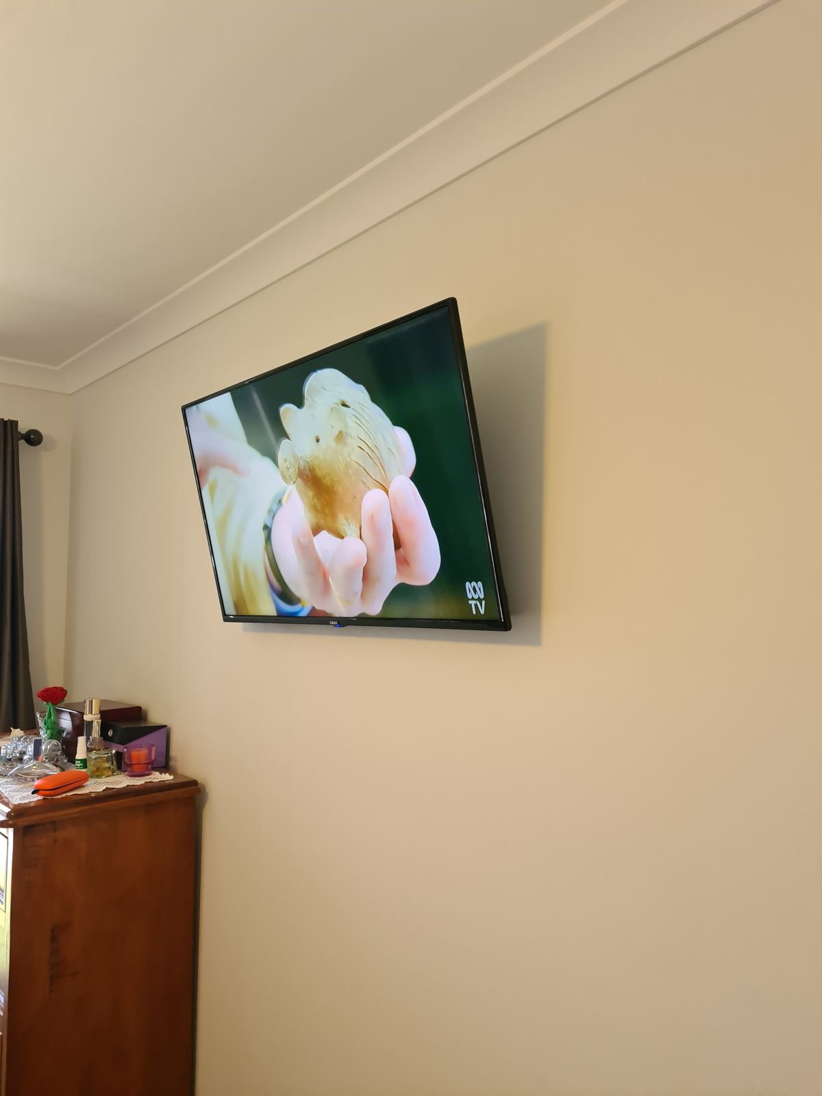 TV wall-mounted with wiring concealed